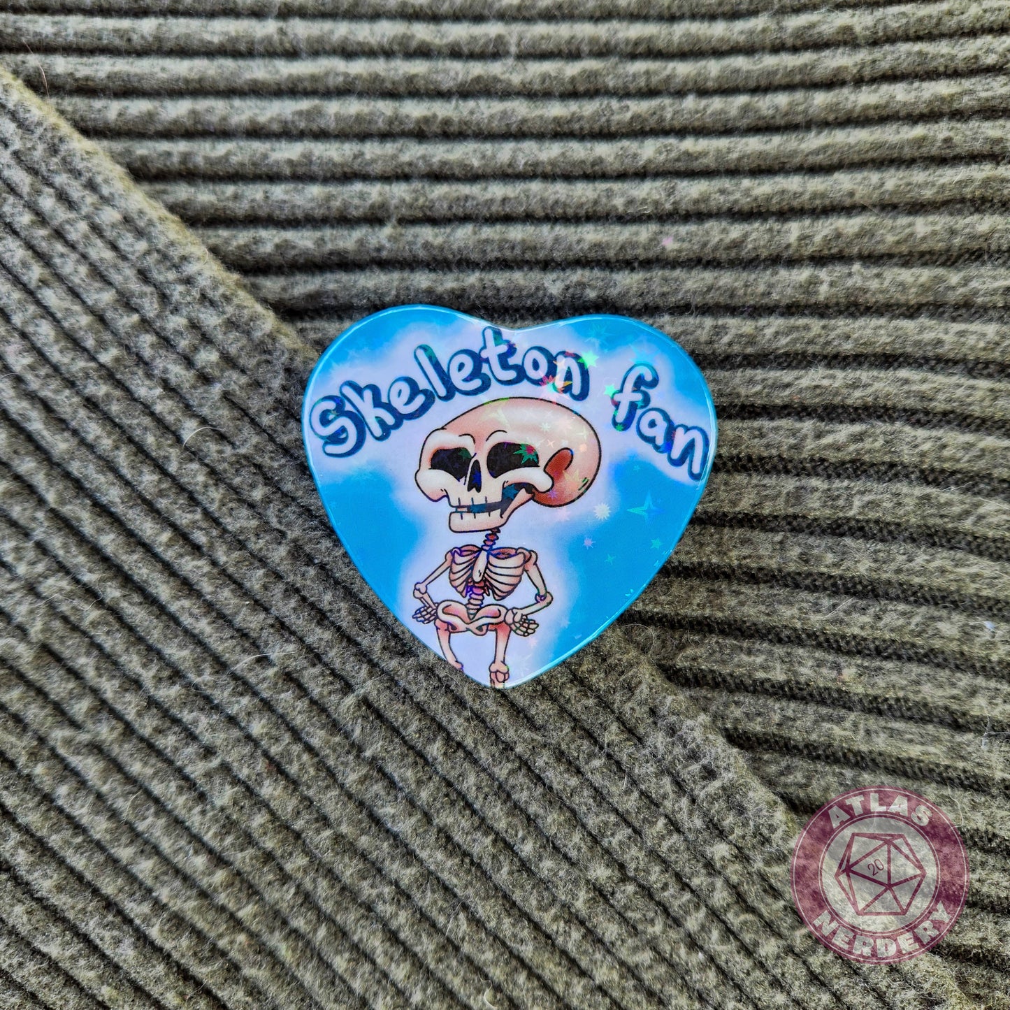 Skeleton Fan - 2.25” x 2” Holographic Heart Shaped Pinback Button