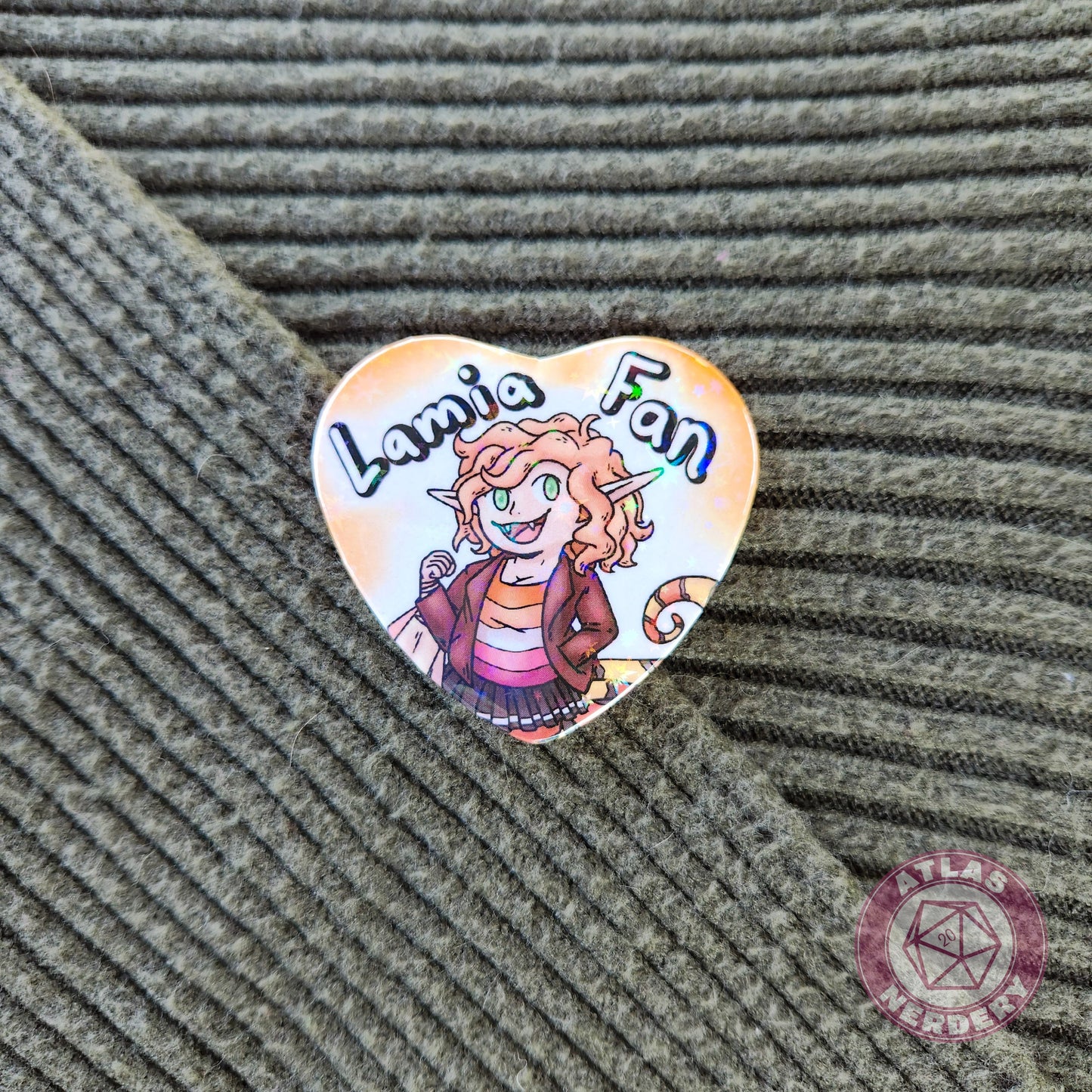 Lamia Fan - 2.25” x 2” Holographic Heart Shaped Pinback Button
