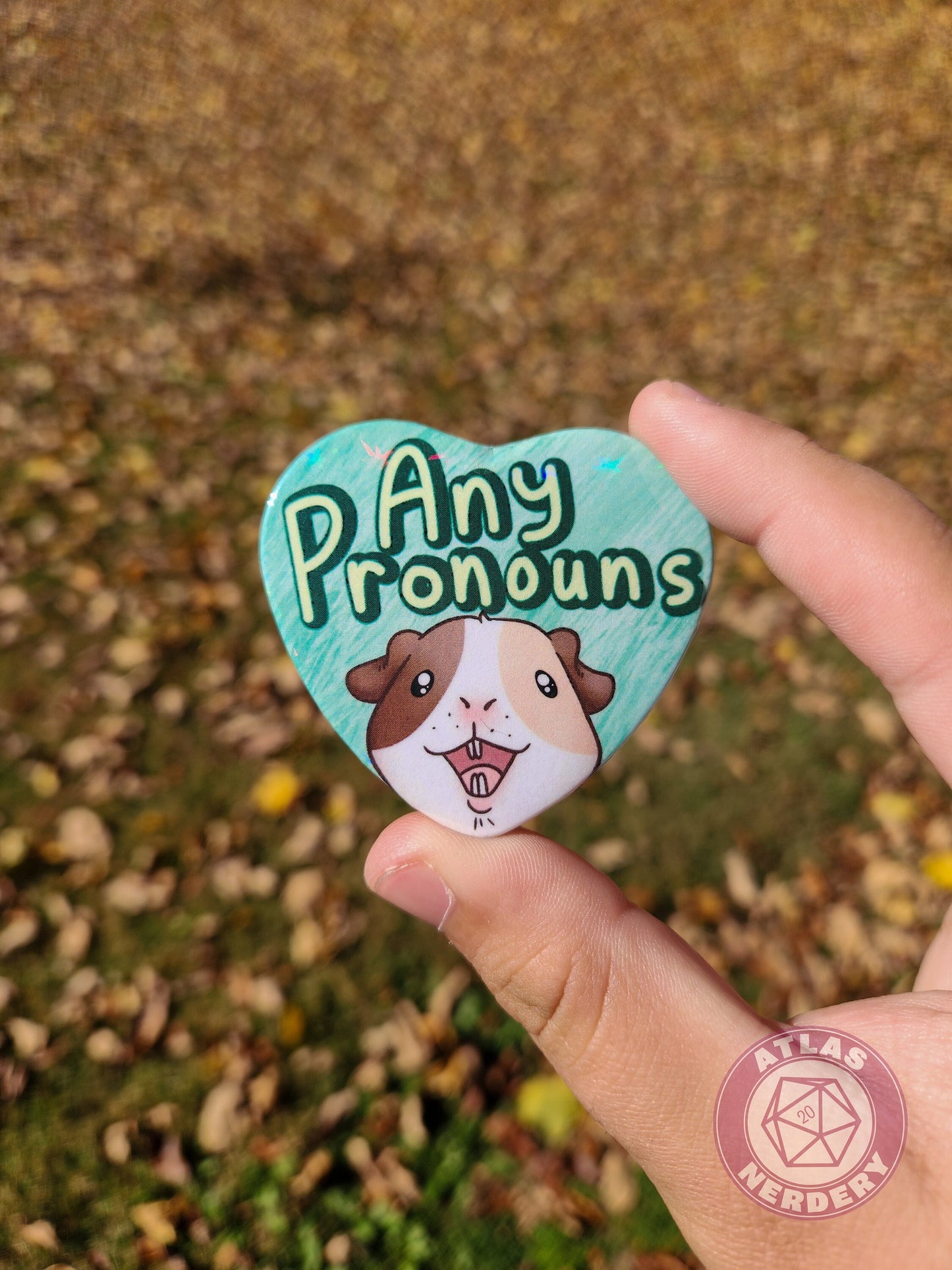 Any Pronouns - Alucard the Guinea Pig Pronoun Button - 2.25” x 2” Holographic Heart Shaped Pinback Button