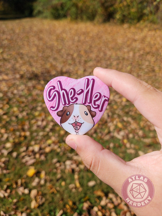 She Her Pronouns - Alucard the Guinea Pig Pronoun Button - 2.25” x 2” Holographic Heart Shaped Pinback Button