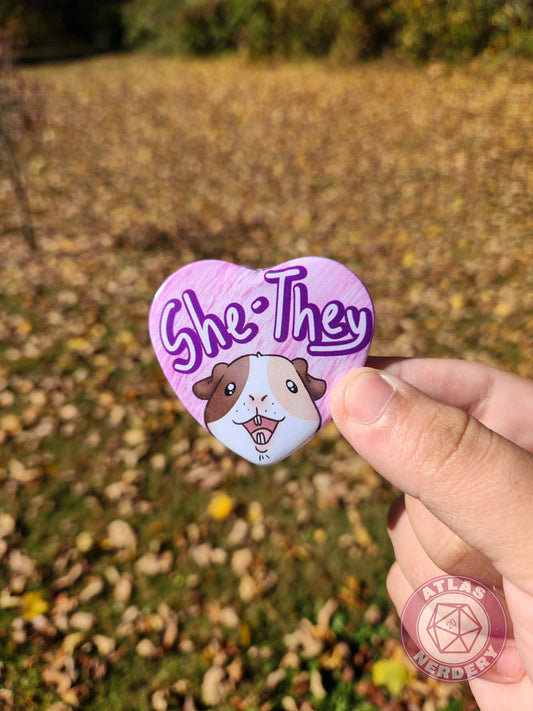 She They Pronouns - Alucard the Guinea Pig Pronoun Button - 2.25” x 2” Holographic Heart Shaped Pinback Button