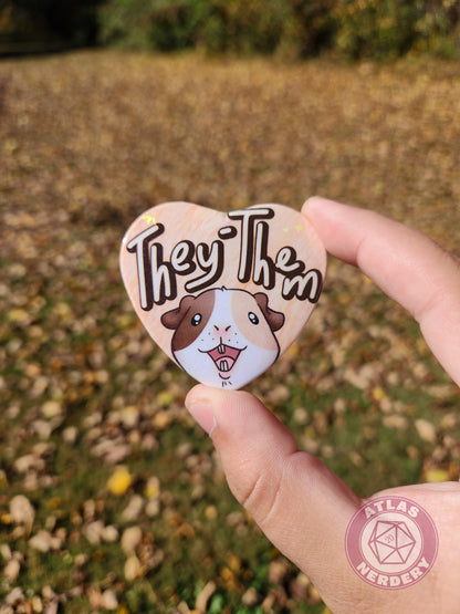 They Them Pronouns - Alucard the Guinea Pig Pronoun Button - 2.25” x 2” Holographic Heart Shaped Pinback Button